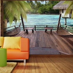 Fototapete - Tropical Landscape - Turquoise water with palm trees and wooden cottages