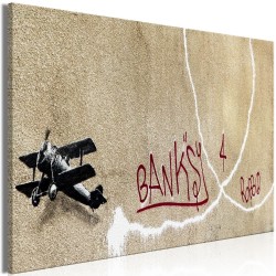 Leinwandbild - Banksys Plane (1-part) - Red Graffiti Text on Mural Background