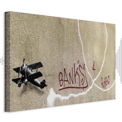 Leinwandbild - Banksys Plane (1-part) - Red Graffiti Text on Mural Background